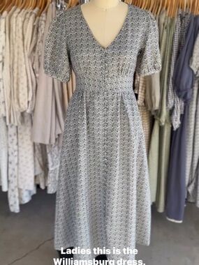 Smocked V‑Neck Midi Dress in Light Gray Floral